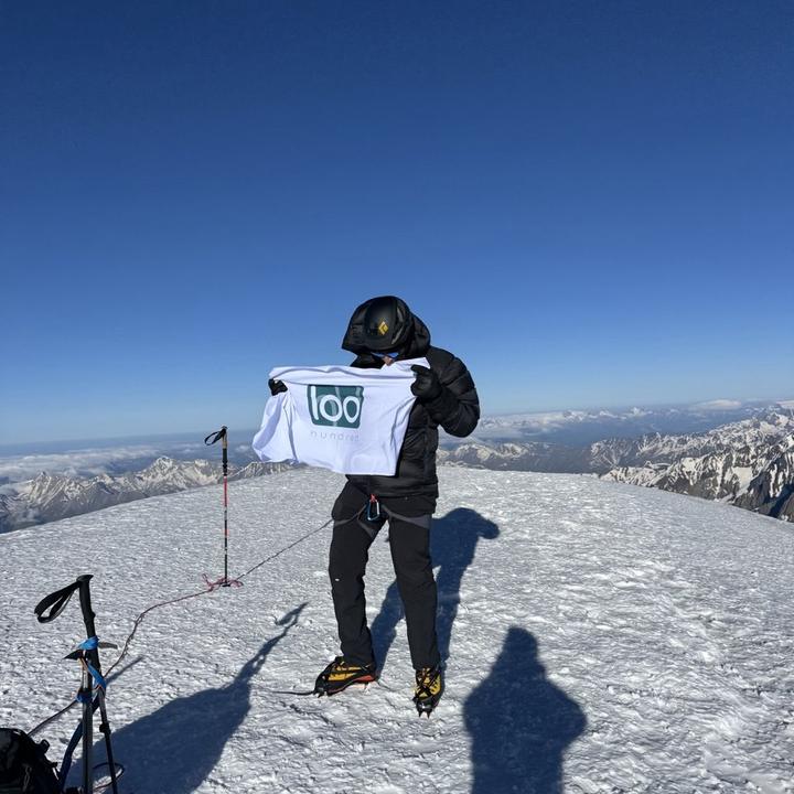 On a summit with the Hundred flag